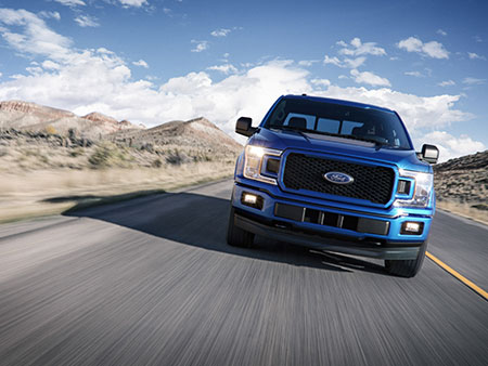Ford truck on the road